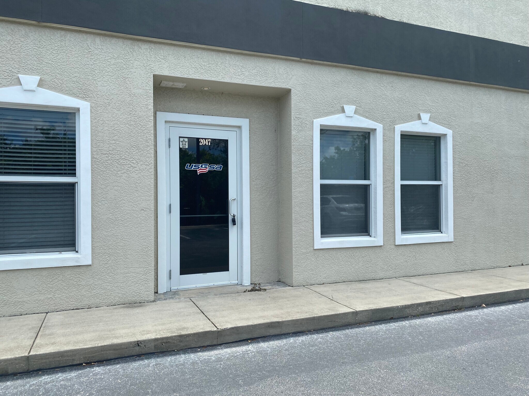 2047-2071 Global Ct, Sarasota, FL for lease Building Photo- Image 1 of 15