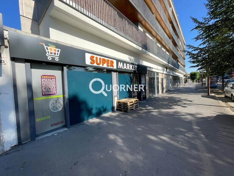 Commerce de détail dans Mantes La Jolie à vendre - Photo du bâtiment - Image 2 de 4