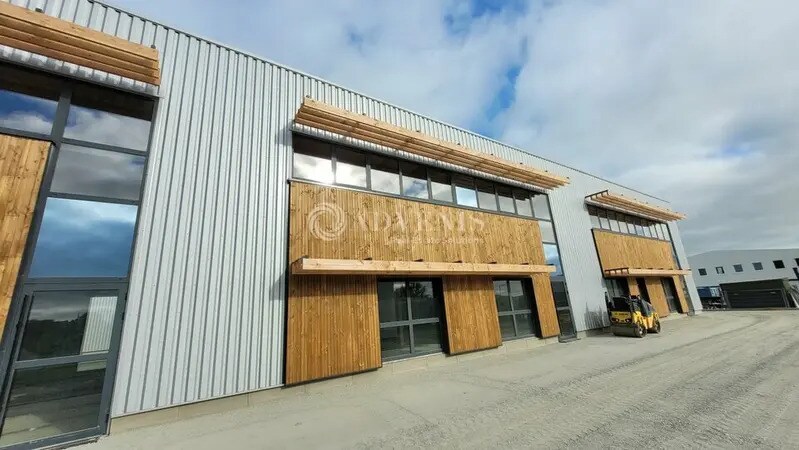 Flex dans GRANDCHAMP-DES-FONTAINES à louer - Photo du bâtiment - Image 2 de 3