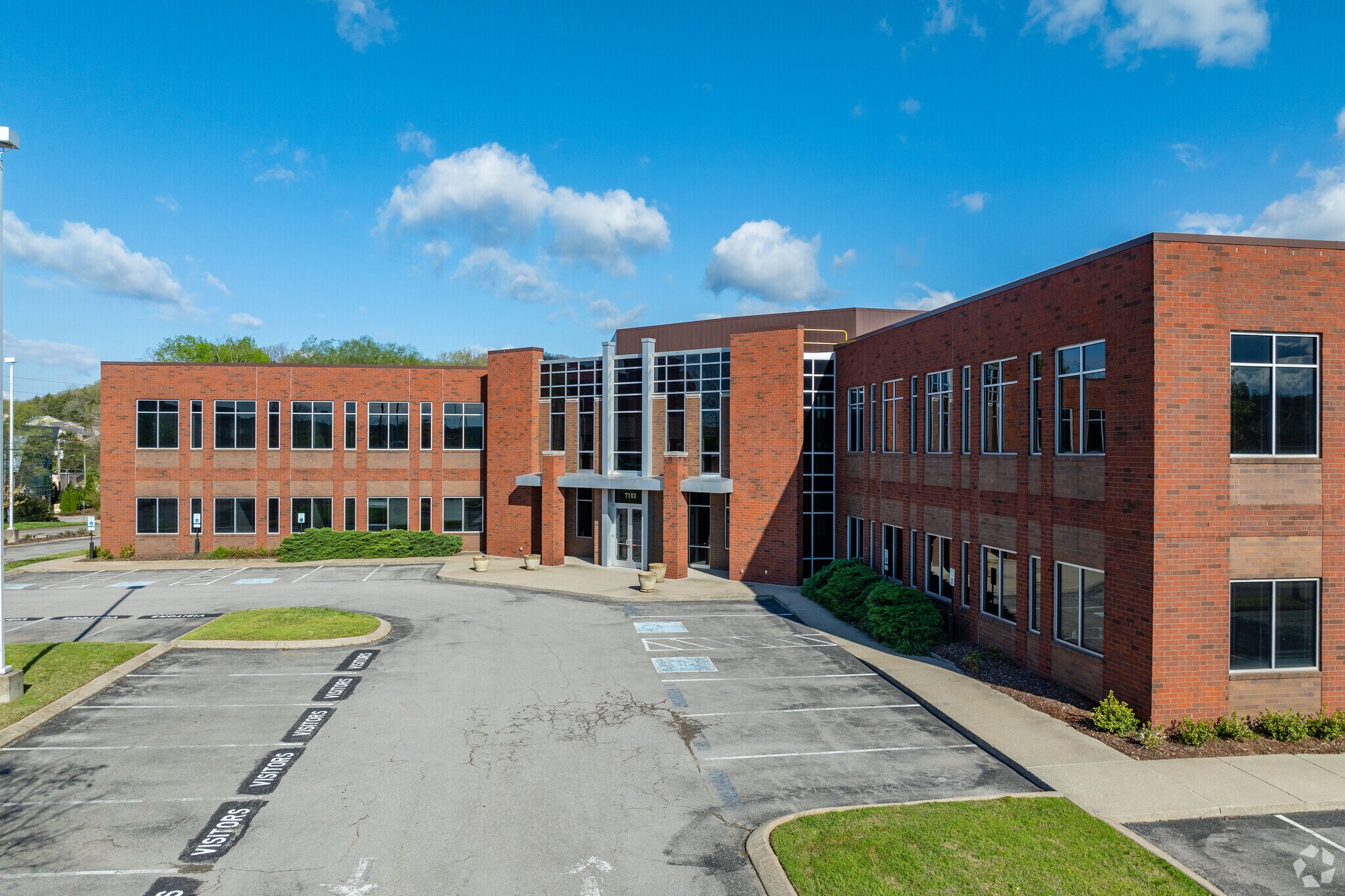 7102 Commerce Way, Brentwood, TN for lease Building Photo- Image 1 of 9
