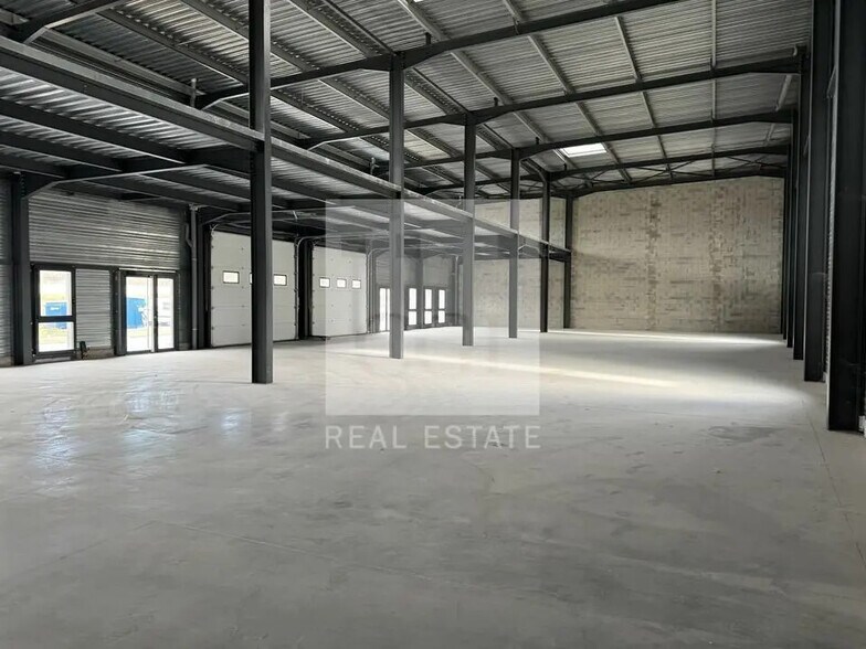 Local d'activités dans Bourgoin-Jallieu à vendre - Photo du bâtiment - Image 3 de 12