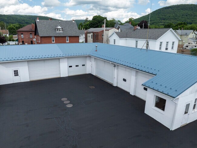 Plus de détails pour 25 E Pulteney St, Corning, NY - Bureau à vendre