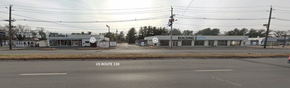 Former Auto Dealership Properties portfolio of 2 properties for sale on LoopNet.ca - Building Photo - Image 2 of 4