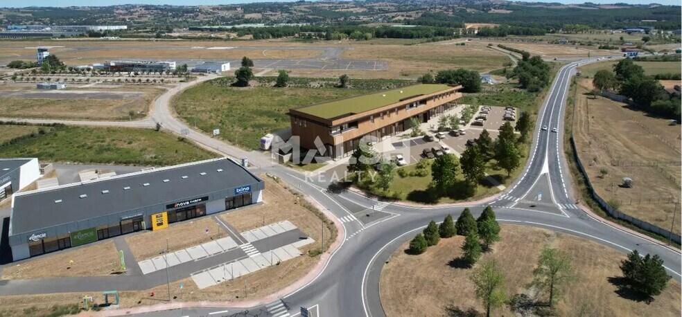 Commerce de détail dans Andrézieux-Bouthéon à louer - Photo du bâtiment - Image 2 de 2