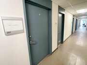 Entrance to #201 - door on the left is public access; door on the right is private access