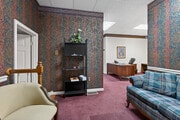 1st floor waiting room looking toward reception at front door.