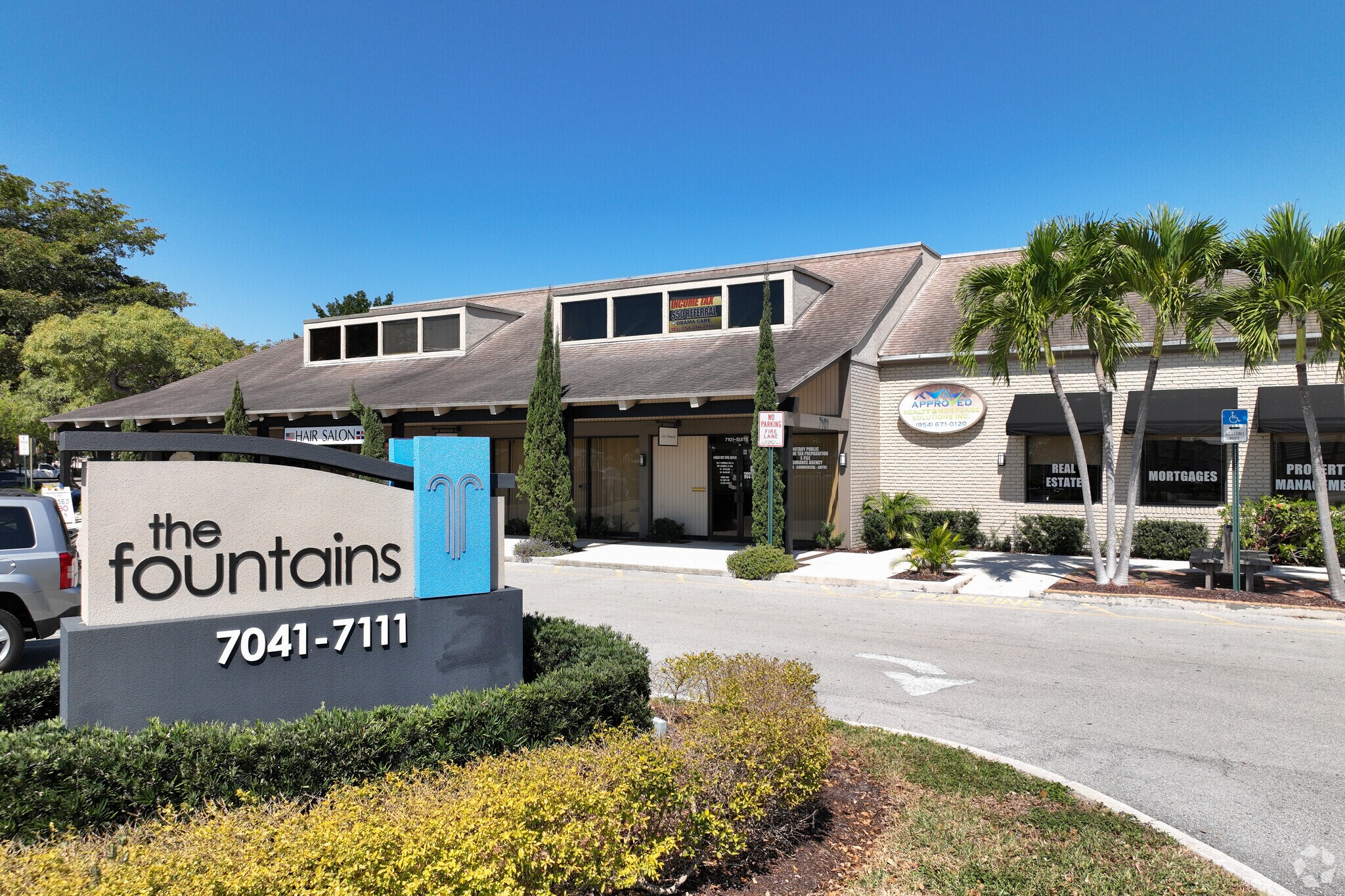 7041-7111 W Commercial Blvd, Tamarac, FL à louer Photo du bâtiment- Image 1 de 13