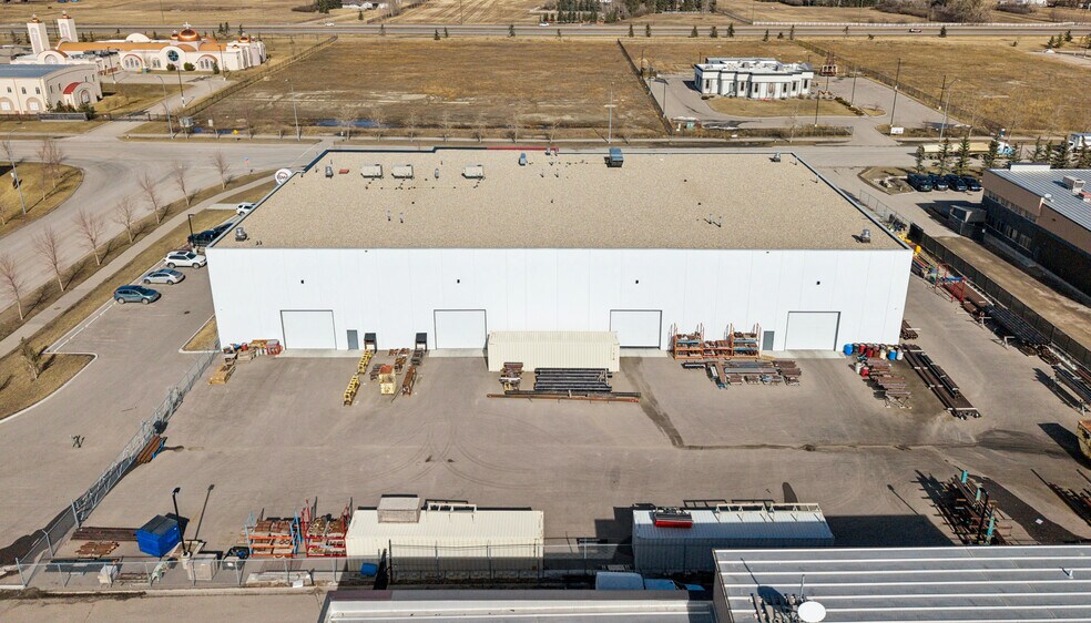 261216 Wagon Wheel Way, Rocky View No 44, AB à vendre - Photo du bâtiment - Image 3 de 14