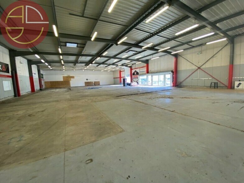 Retail in Aucamville for lease - Building Photo - Image 1 of 4