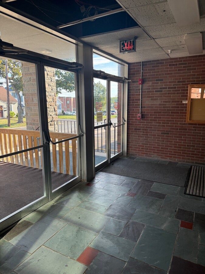 214 Kinne St, East Syracuse, NY 13057 - Unit Gymnasium -  - Lobby - Image 1 of 9