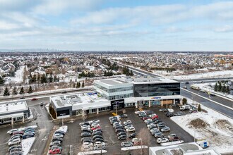 8005 Boul Du Quartier, Brossard, QC - Aérien Vue de la carte