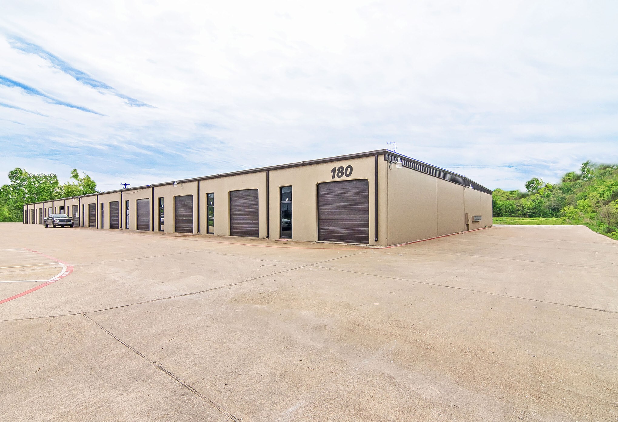 180 Industrial Blvd, McKinney, TX for lease Building Photo- Image 1 of 4