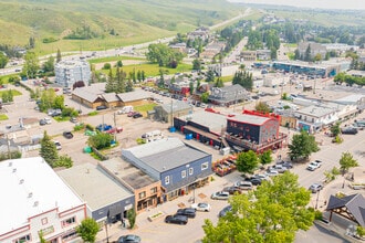 312 1st St W, Cochrane, AB - AERIAL  map view - Image1