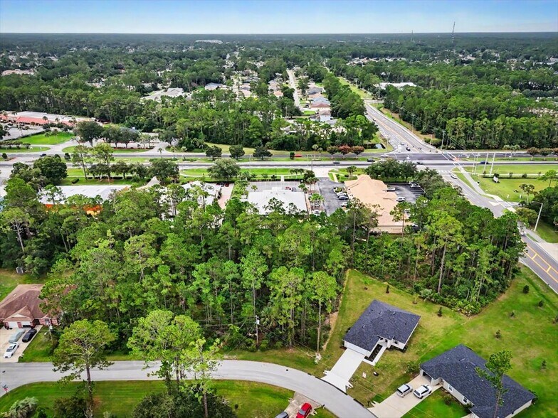 5006 Palm Coast Pky NW, Palm Coast, FL à vendre - Photo du bâtiment - Image 3 de 38