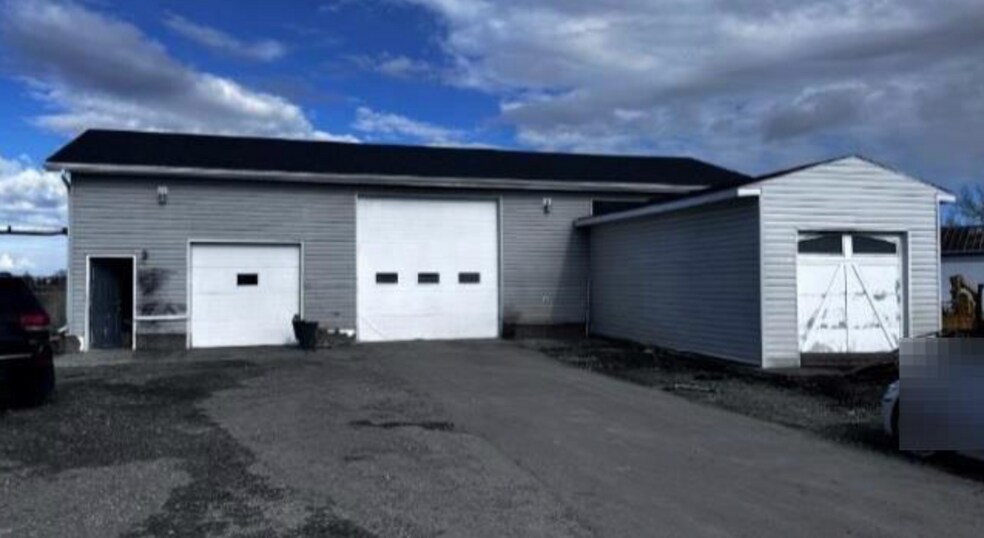 251223 Sunshine Rd, Rocky View No 44, AB à vendre - Photo du bâtiment - Image 3 de 15