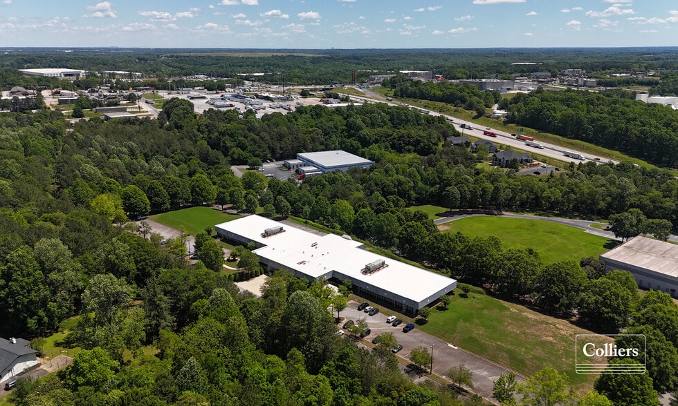 310 Inglesby Land and Office Building portfolio of 2 properties for sale on LoopNet.ca - Building Photo - Image 3 of 7