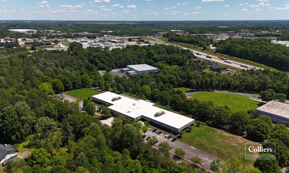 310 Inglesby Land and Office Building portefeuille de 2 propriétés à vendre sur LoopNet.ca - Photo du bâtiment - Image 3 de 7