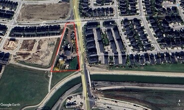 240187 Rainbow Rd, Chestermere, AB - AERIAL map view - Image1
