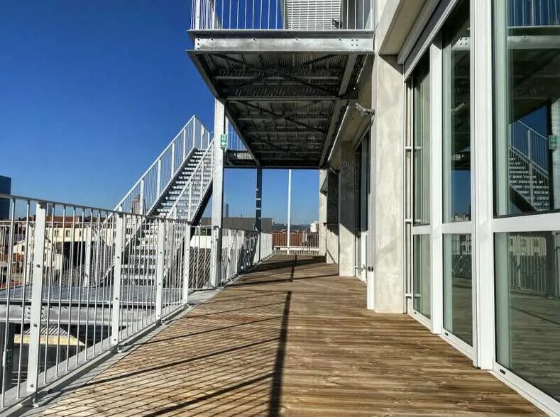 28 Rue Mansard, Villeurbanne à louer - Photo du bâtiment - Image 2 de 14