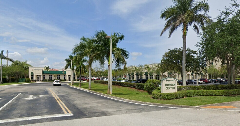 5493 Wiles Rd, Coconut Creek, FL à vendre - Photo du b timent - Image 2 de 7