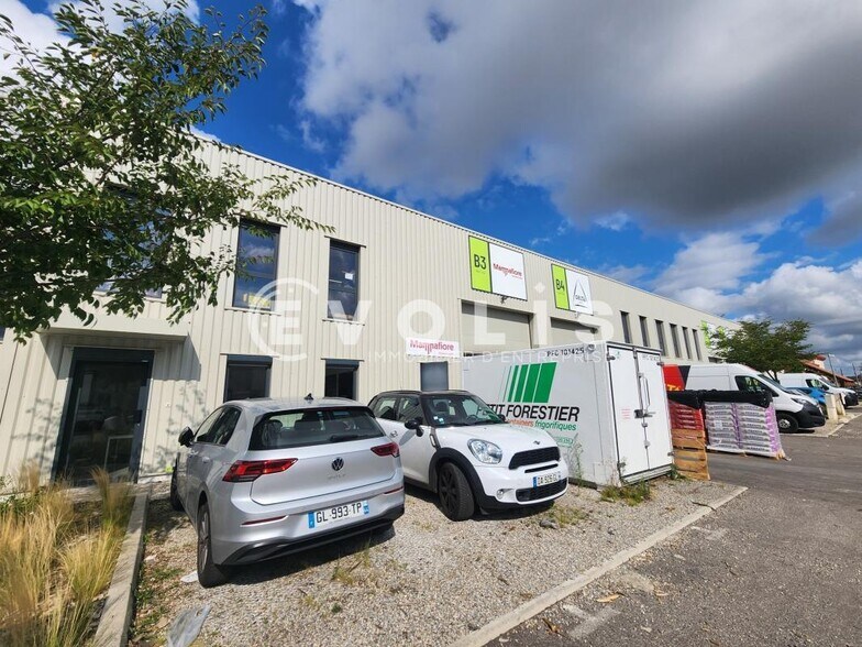 55 Rue Emile Zola, Décines-Charpieu à louer - Photo du bâtiment - Image 2 de 22