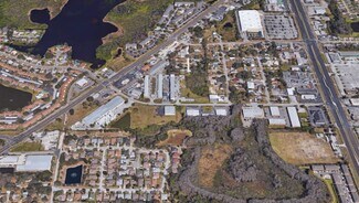 Plus de détails pour 4050-4060 Louis Ave, Holiday, FL - Industriel à louer