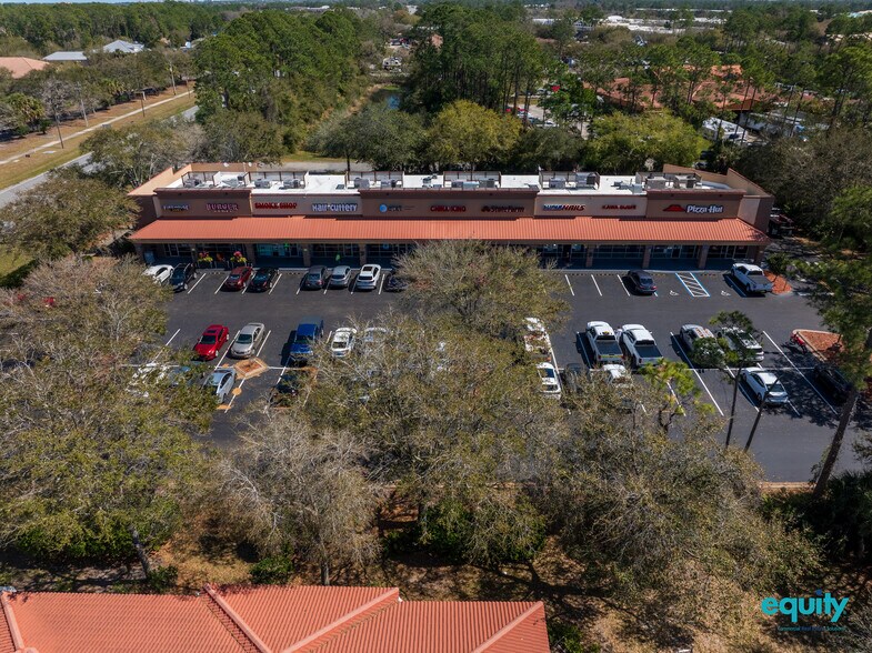 1475 Palm Coast Pky NW, Palm Coast, FL à vendre - Photo du bâtiment - Image 2 de 6