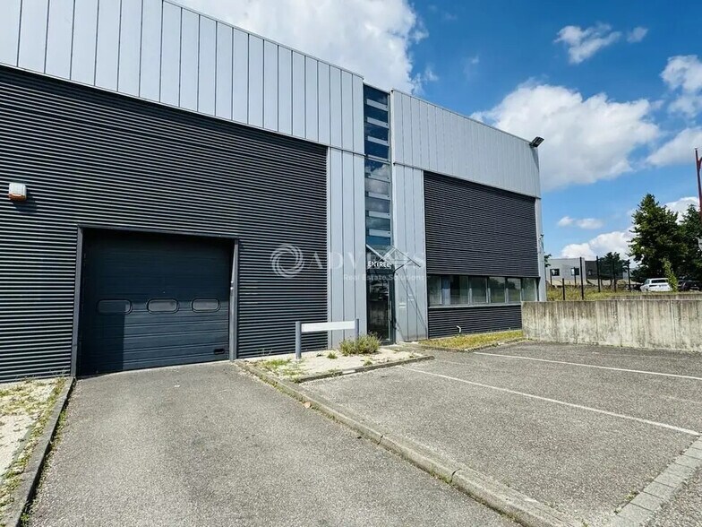 Flex dans Mundolsheim à louer - Photo du bâtiment - Image 2 de 4