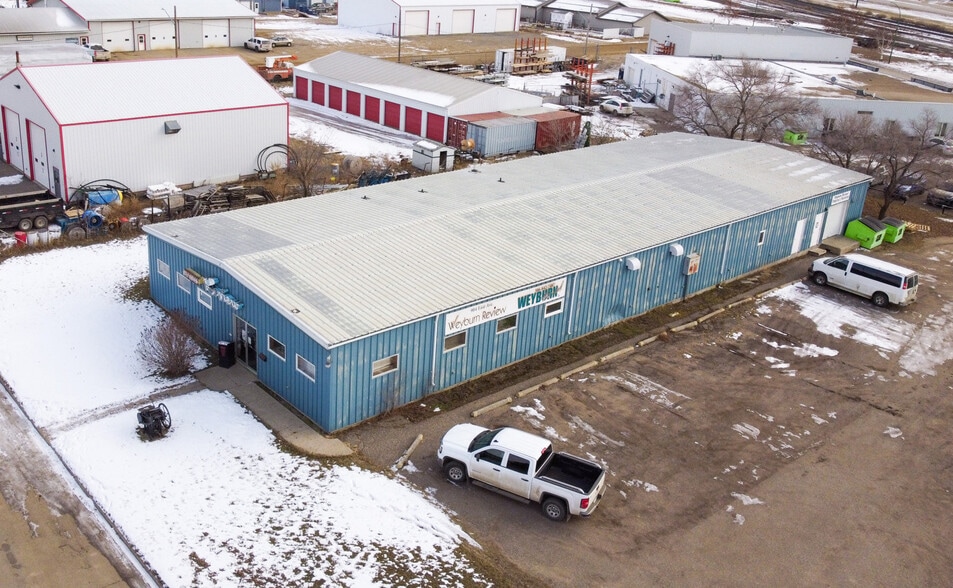 904 East Ave, Weyburn, SK à vendre - Photo du bâtiment - Image 1 de 7