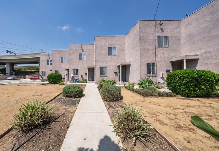 517 W 117th St, Los Angeles, CA à vendre - Photo du bâtiment - Image 1 de 7