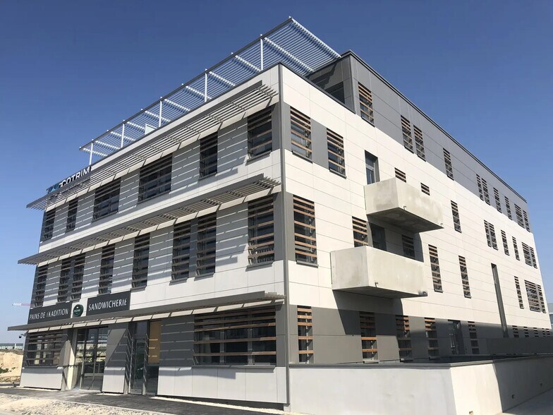 8 Rue Jules Méline, Bezannes à louer - Photo du bâtiment - Image 1 de 12