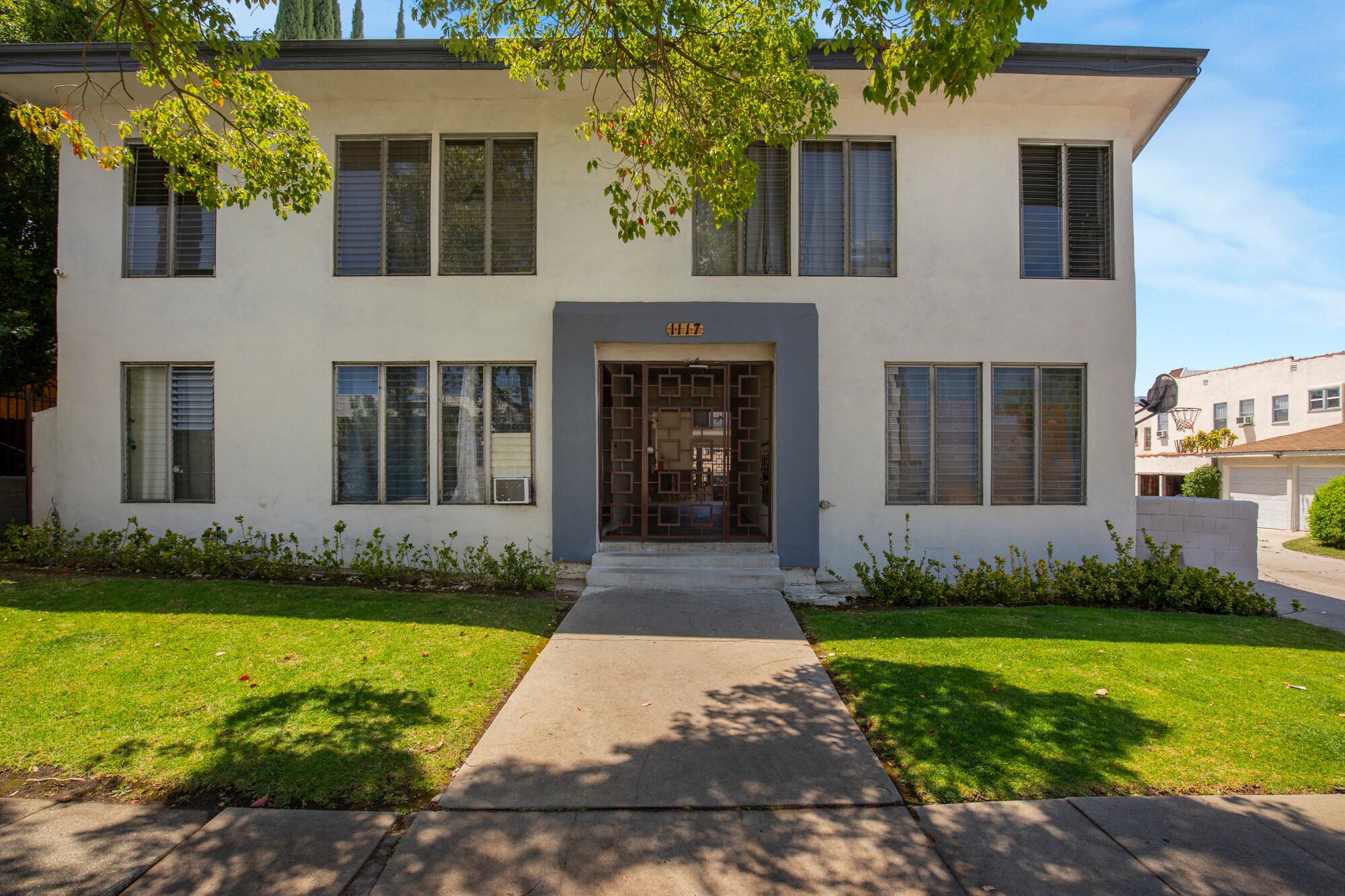 1117 S Spaulding Ave, Los Angeles, CA à vendre Photo du bâtiment- Image 1 de 25