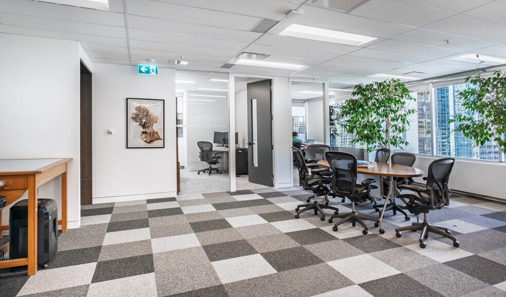 140 4 Av SW, Calgary, AB à louer - Photo du bâtiment - Image 2 de 5