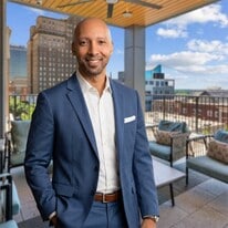 Lane Banner with Mitchell Forbes Global Pr