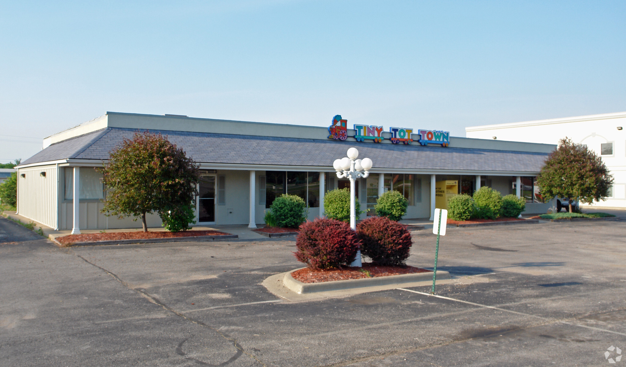 210 W Walnut St, Raymore, MO for lease Building Photo- Image 1 of 2