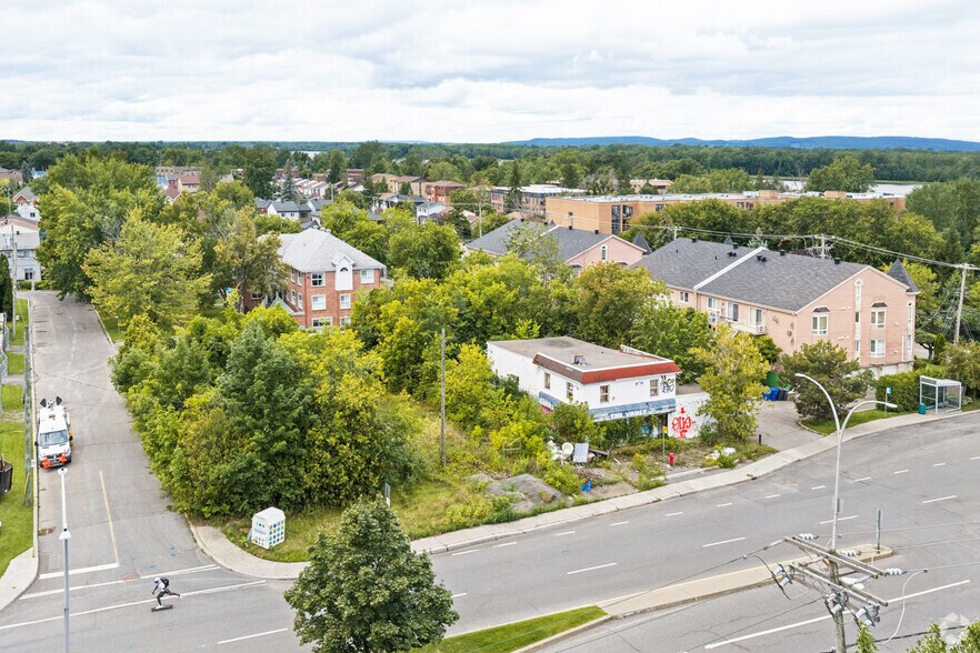 4998 Boul Saint-Charles, Montréal, QC à vendre - Photo principale - Image 2 de 3