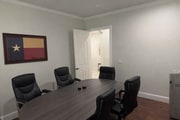 Professional conference room with Texas flag