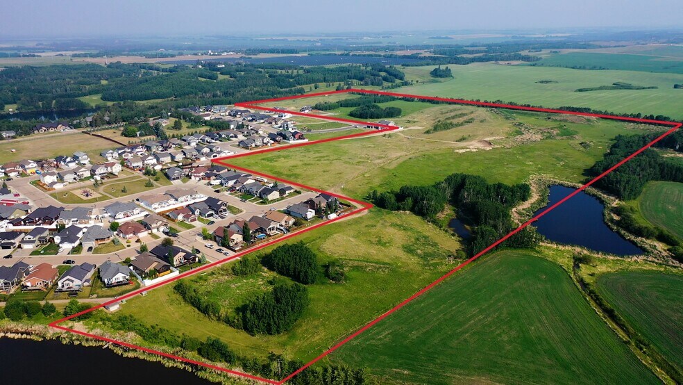 6740 Cedar Way, Innisfail, AB à vendre - Photo du bâtiment - Image 1 de 10