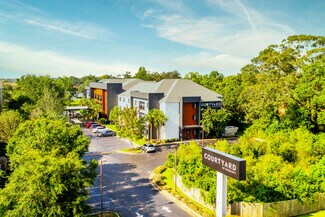 Plus de détails pour 451 Creighton Rd, Pensacola, FL - Services hôteliers à vendre