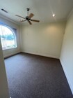 Large office with window overlooking the pond