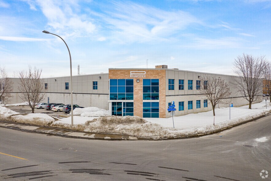 5600-5630 Rue Ernest-Cormier, Laval, QC à louer - Photo du bâtiment - Image 1 de 4
