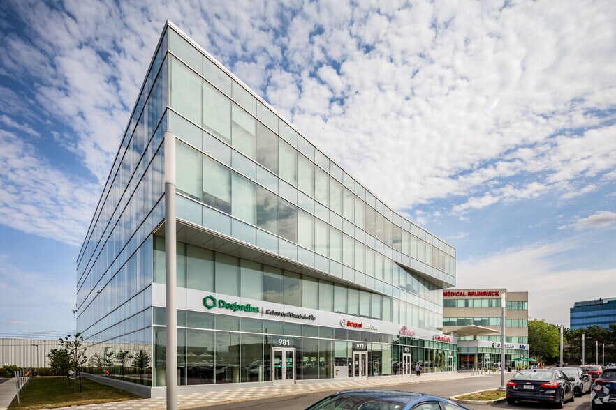 953-981 Boul Saint-Jean, Pointe-claire, QC à vendre - Photo principale - Image 1 de 1