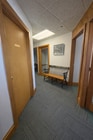 Quiet office corridor with wooden accents