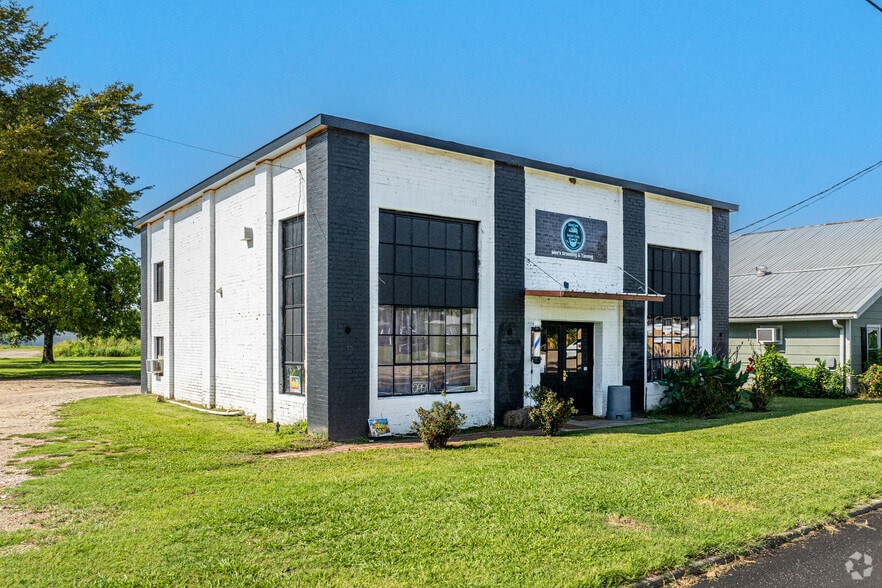 923 W Dallas Ave portfolio of 4 properties for sale on LoopNet.ca - Primary Photo - Image 1 of 1