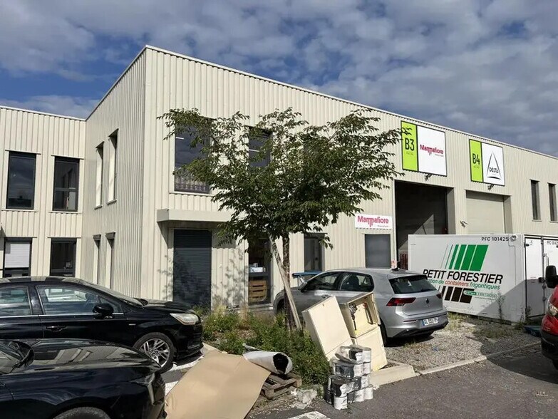 55 Rue Emile Zola, Décines-Charpieu à louer - Photo du bâtiment - Image 3 de 15