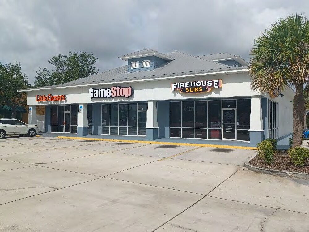 1080 N Wickham Rd, Melbourne, FL à louer Photo du bâtiment- Image 1 de 4