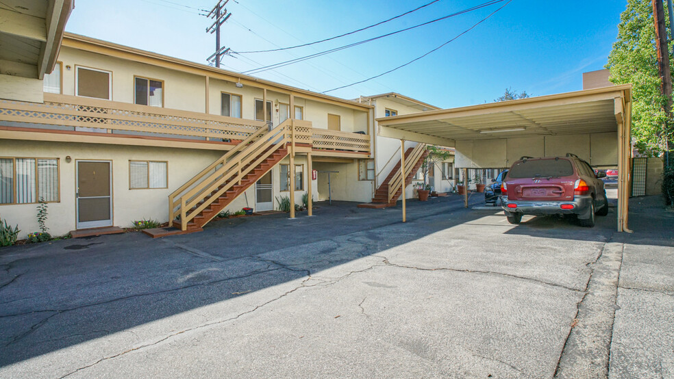 151 Maynard St. & 1502 E Broadway portfolio of 2 properties for sale on LoopNet.ca - Building Photo - Image 3 of 8