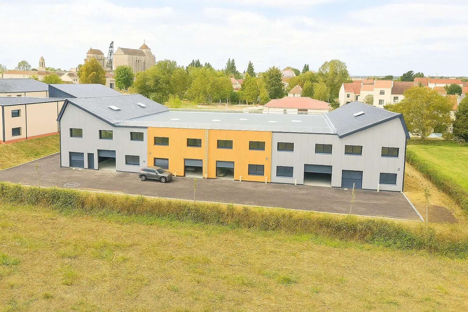 Local d'activités dans Hérouville-en-Vexin à vendre Photo du bâtiment- Image 1 de 9