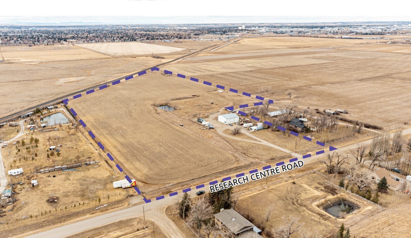 1850 58 St S, Diamond City, AB à vendre Aérien- Image 1 de 1