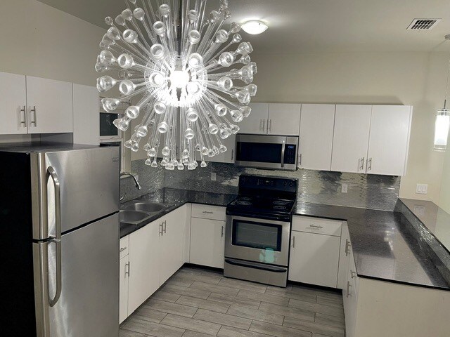 Portfolio of 4 Plex's at Medical Ridge portefeuille de 2 propriétés à vendre sur LoopNet.ca - Photo du bâtiment - Image 3 de 4